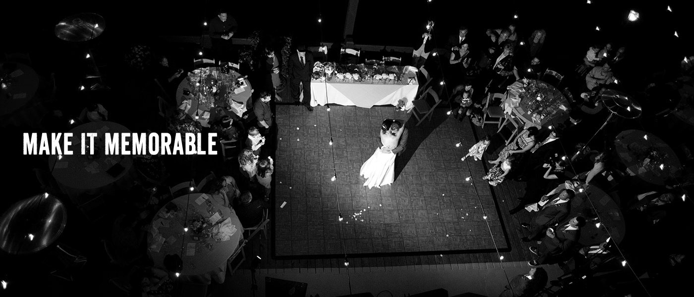 Bride and Groom dancing on the Village Deck.