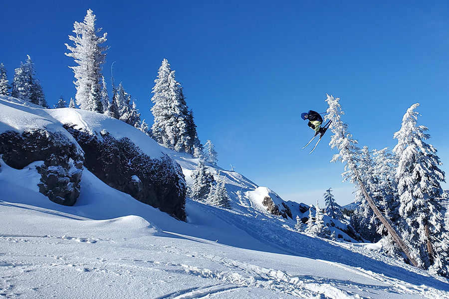 Sugar Bowl Ski Team Member Making a hard turn through a Sugar Bowl gate.