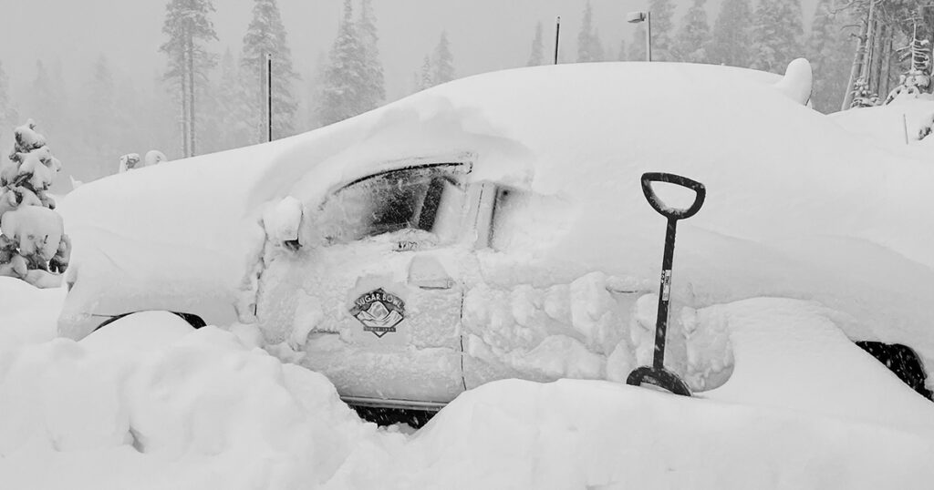 Truck buried in snow