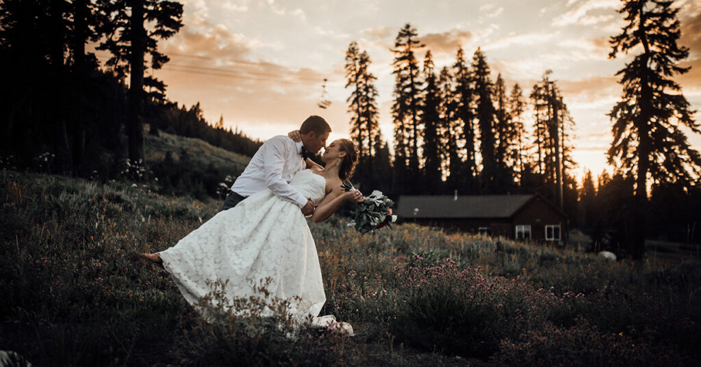 A newlywed couple at sunset