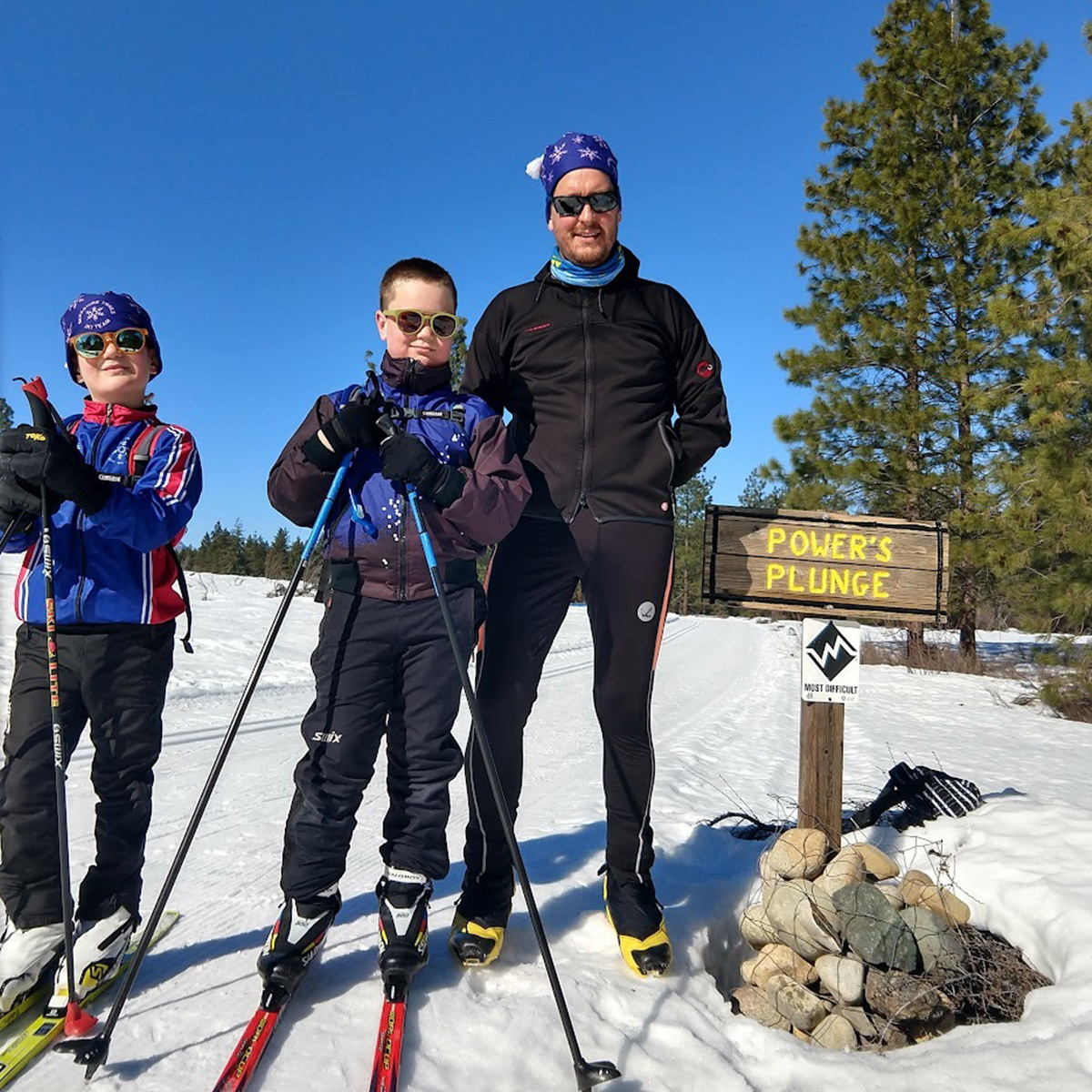 A family on the trail for nordic skiing