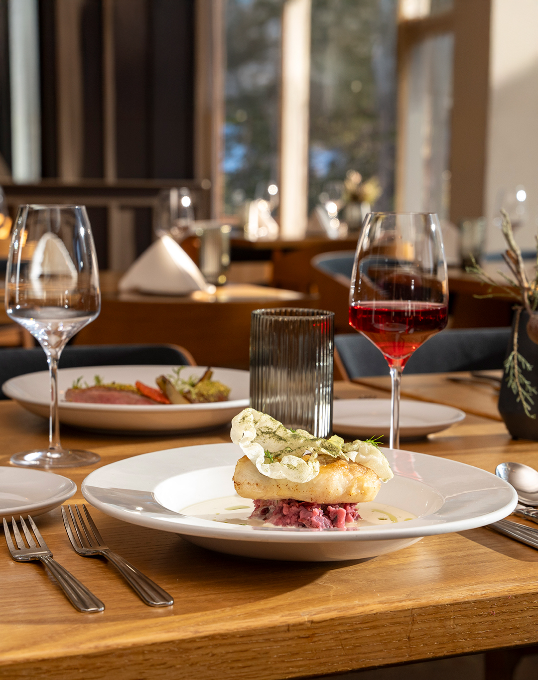 A rustic and elegant table setting on mountain at Sugar Bowl Dining Room